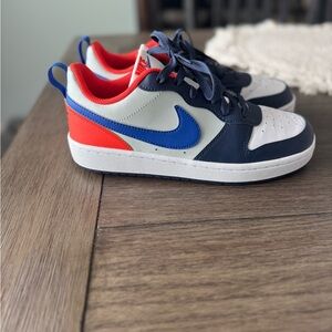 Nike Court Borough Low Navy, Blue, and Orange Sneakers.
